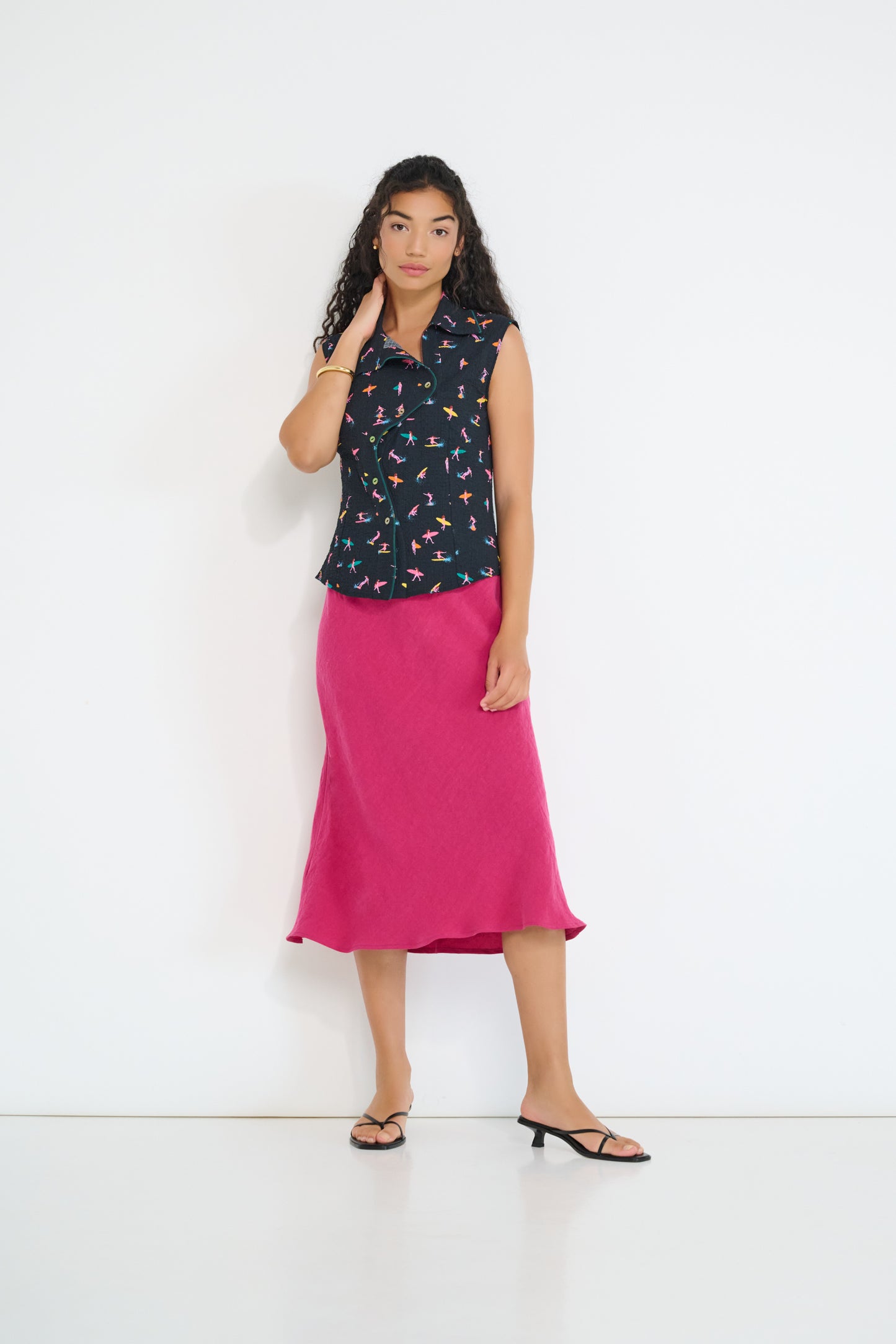 Model wearing Coastline Bias Skirt Magenta European flax linen bias cut midi skirt made in Canada