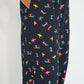 Coastline Pants Petit Surfer print detail showing scalloped ivory linen patch pocket on black French cotton seersucker fabric