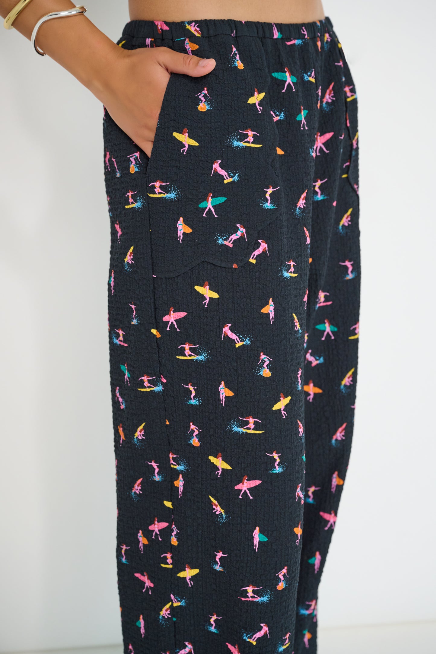 Coastline Pants Petit Surfer print detail showing scalloped ivory linen patch pocket on black French cotton seersucker fabric
