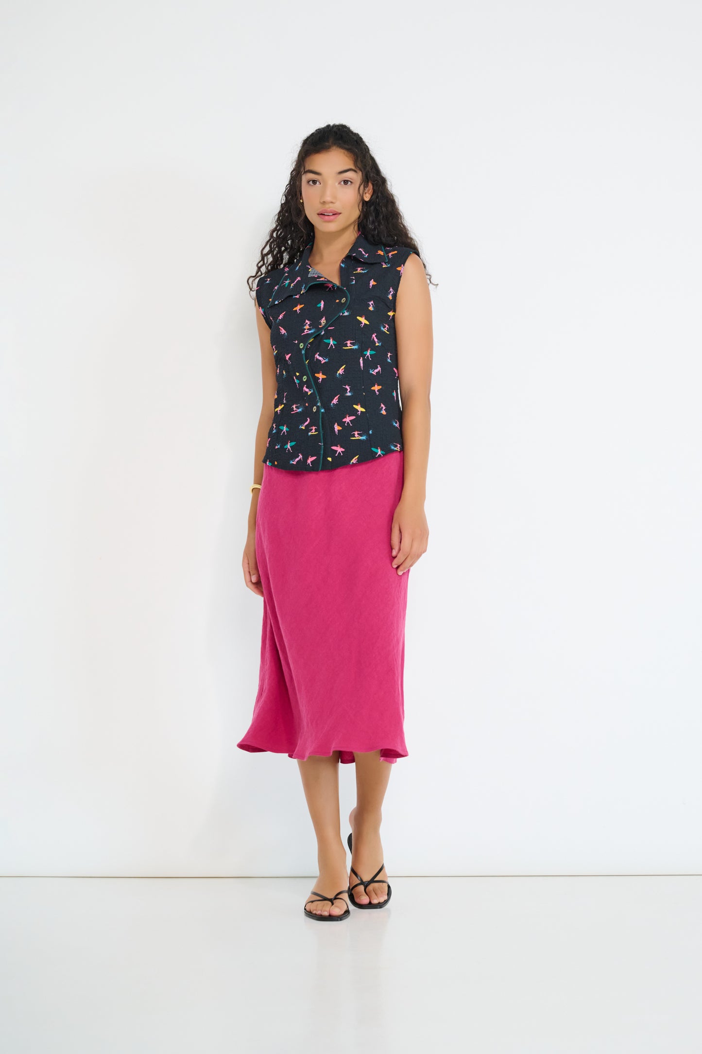 Model wearing Reverie Vest Petit Surfer French cotton seersucker with asymmetrical embroidered closure made in Canada