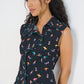 Reverie Vest Petit Surfer asymmetrical embroidered button-tab closure with seashell buttons made in Canada
