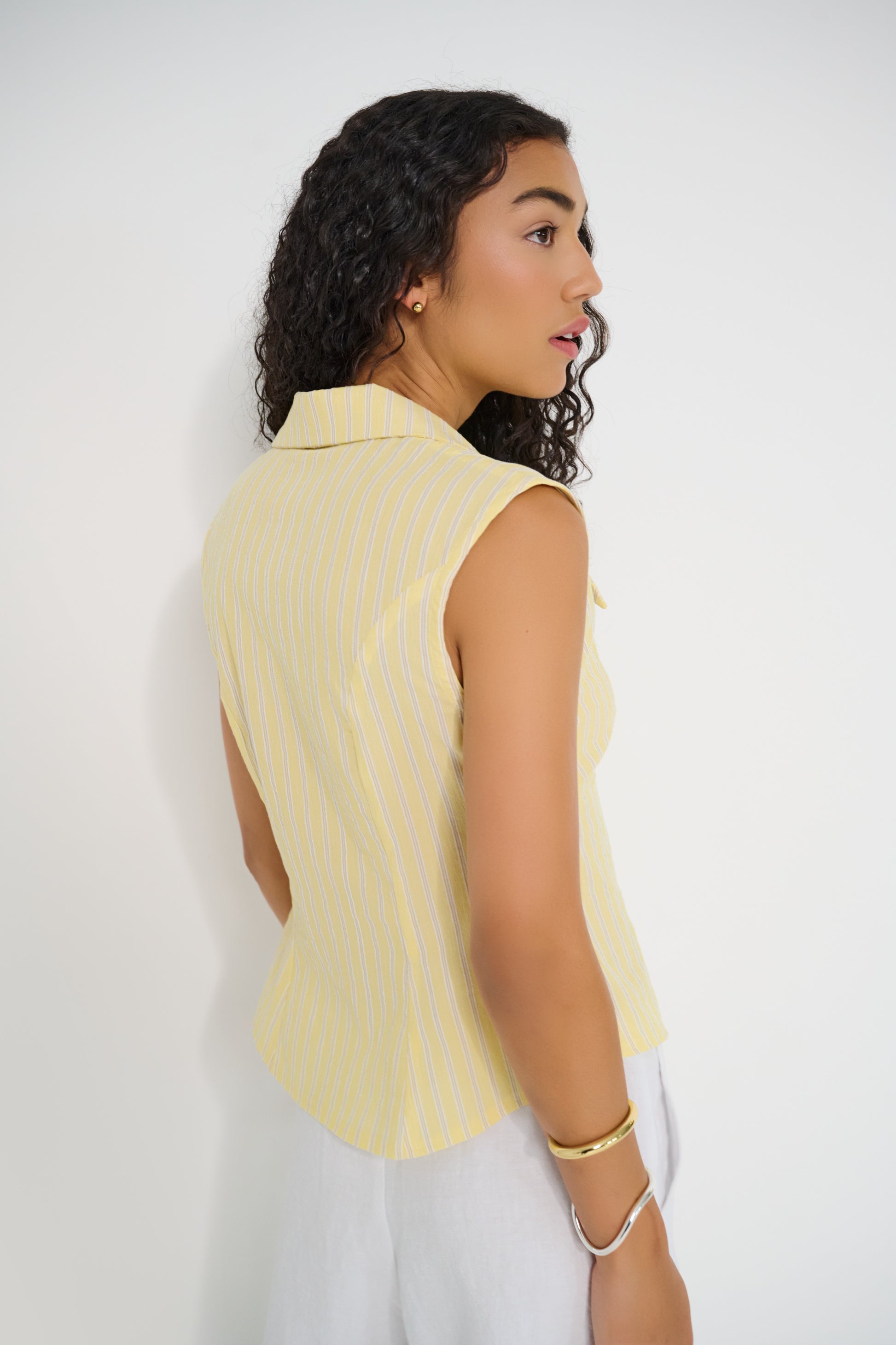 Reverie Vest in sunbeam stripe Japanese cotton, back view showing fitted silhouette, made in Canada