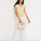 Reverie Vest in sunbeam stripe Japanese cotton styled with wide-leg trousers, lightweight summer vest made in Canada