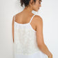 Stellaire Camisole in white linen with ivory lace panel and adjustable straps, back view made in Canada