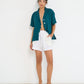 Stellaire Shorts in white linen with ivory lace patch pockets, relaxed summer shorts made in Montreal