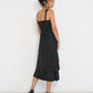 Twisted Basics dress in black Japanese twill back view with shirred back bodice and full skirt – Made in Canada