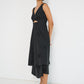 Twisted Basics dress in black Japanese twill side view showing layered skirt and twisted front detail – Made in Canada