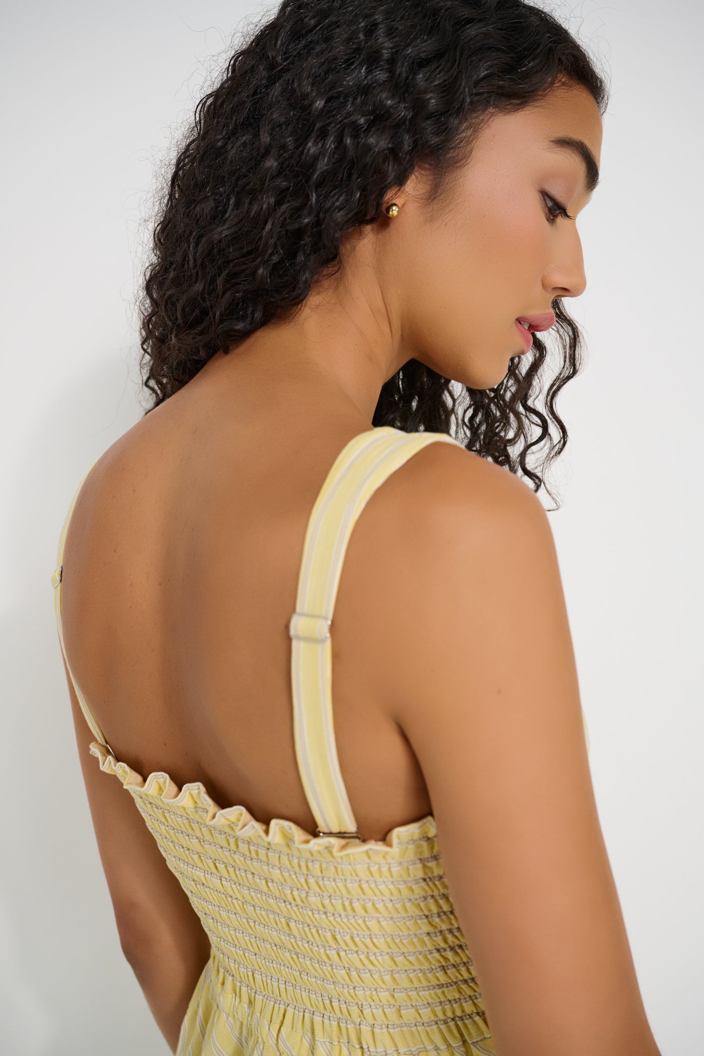 Ultimate Summer Dress in butter yellow striped Japanese cotton with adjustable shoulder straps and shirred back panel for a flexible fit, made in Canada