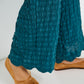 Voyage Pants deep teal seersucker fabric detail with scalloped hem and relaxed fit