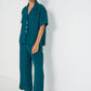Voyage Pants in deep teal linen-viscose seersucker with scalloped hem, lightweight breathable fabric, made in Canada