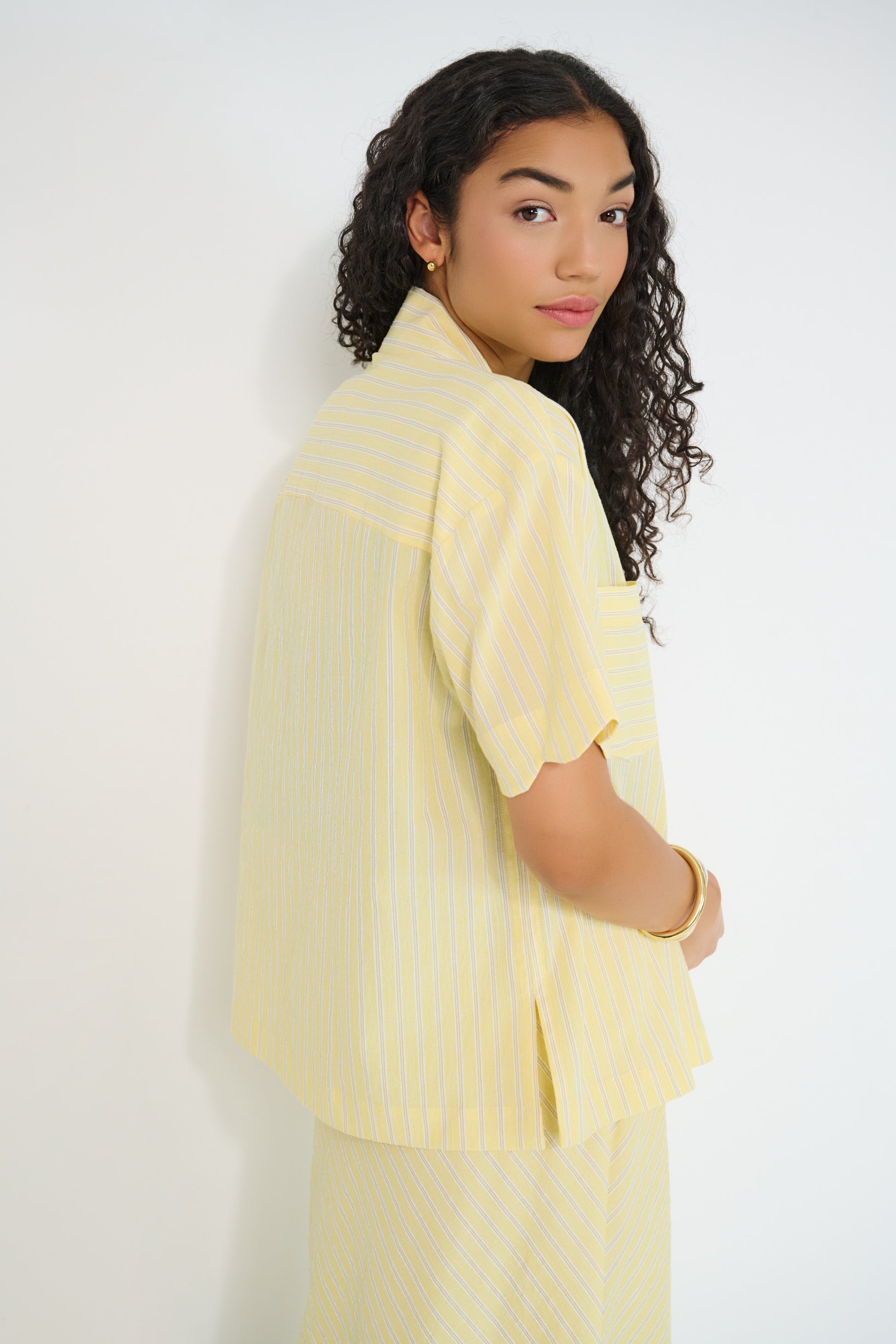 Voyage Shirt in sunbeam stripe Japanese cotton, back view showing relaxed silhouette, made in Canada