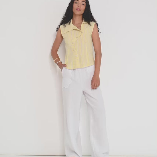 Reverie Vest in sunbeam stripe Japanese cotton on model, versatile fitted summer vest made in Canada