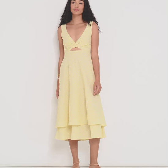 Ultimate Summer Dress in butter yellow striped Japanese cotton showing flowing midi silhouette and adjustable straps, perfect for summer events, made in Canada