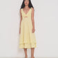 Ultimate Summer Dress in butter yellow striped Japanese cotton showing flowing midi silhouette and adjustable straps, perfect for summer events, made in Canada