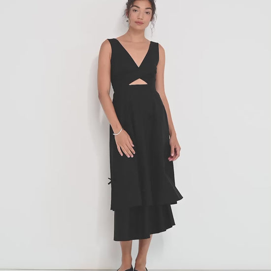 Twisted Basics dress in black Japanese twill on model showing movement of layered skirt and twisted bodice – Made in Canada
