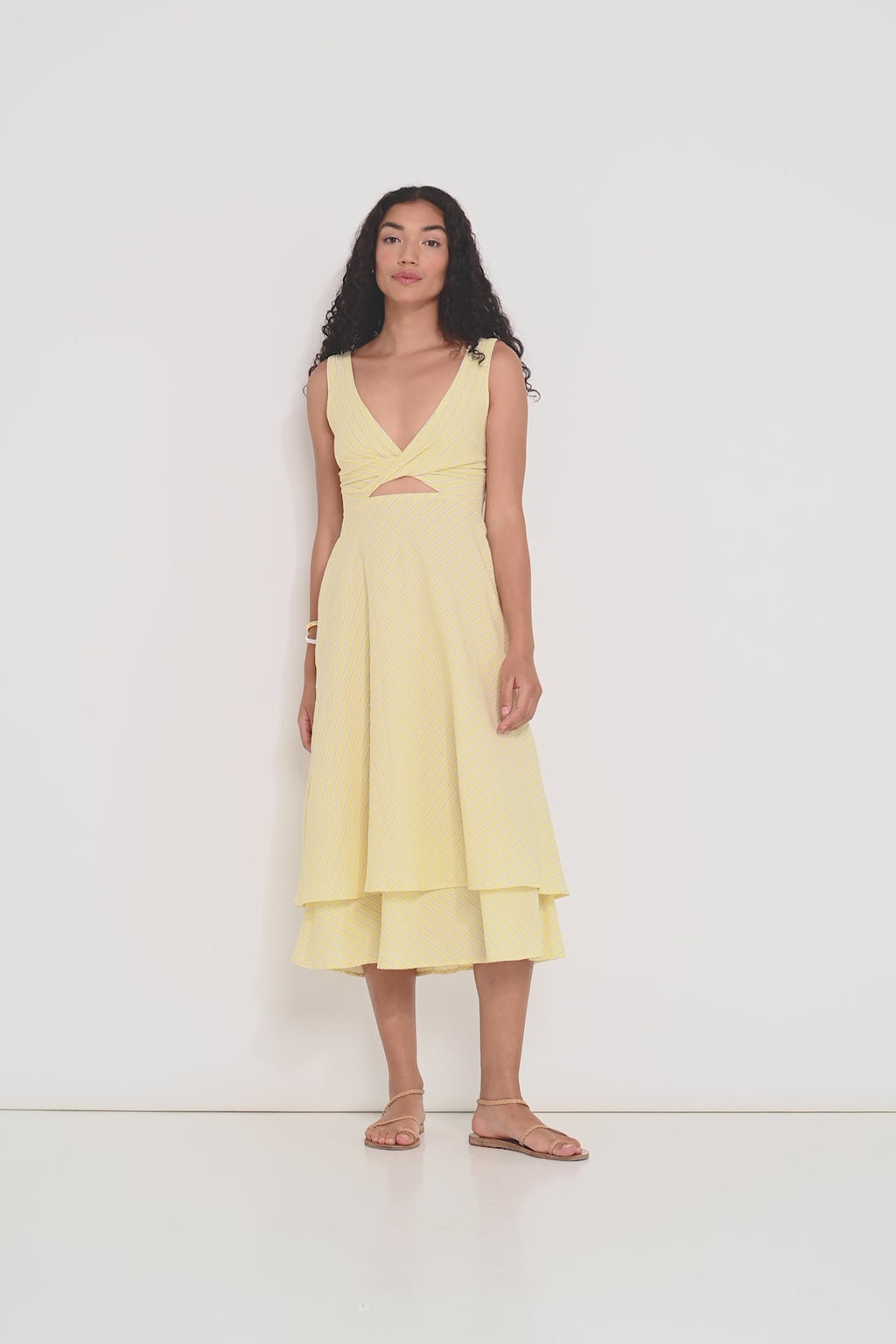 Ultimate Summer Dress in butter yellow striped Japanese cotton showing flowing midi silhouette and adjustable straps, perfect for summer events, made in Canada