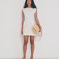 Stellaire Dress in white linen with ivory lace detail shown in movement, lightweight summer dress made in Canada